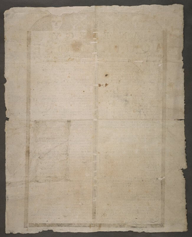 The back of this broadsheet shows the ink bleeding through from the front, as well as the small patches that have been made to repair the damage from being folded.